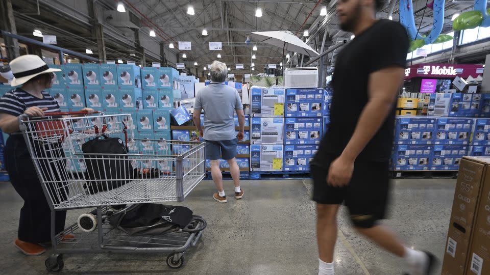 A man looks at air-conditioners for sale at a Costco retail store in the Queens borough of New York City, NY, June 18, 2024. - Anthony Behar/SIPPL Sipa/AP