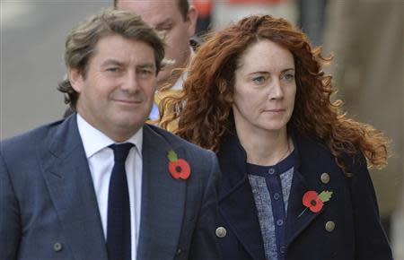 Former News International chief executive Rebekah Brooks and her husband Charlie arrive at the Old Bailey courthouse in London November 7, 2013. REUTERS/Toby Melville