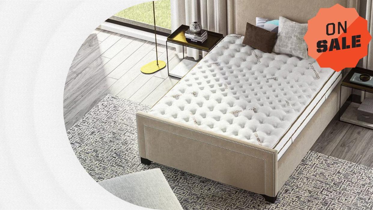 a bed with a white cover