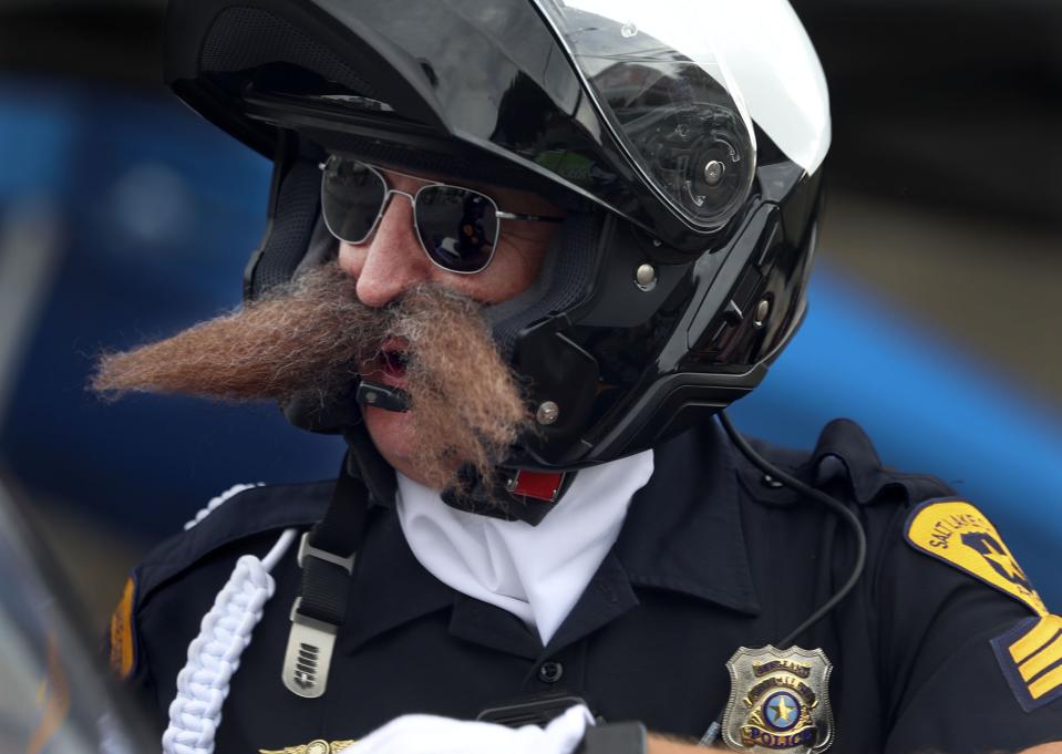 Salt Lake City Police officer Rory Carlisle sports a mustache during the Days of ‘47 Parade in Salt Lake City on Monday, July 24, 2023. | Laura Seitz, Deseret News