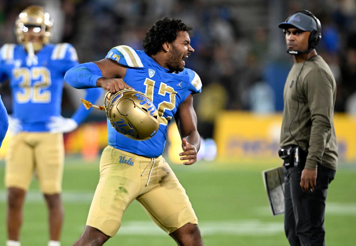 Nov 11, 2023; Pasadena, California, USA; UCLA Bruins defensive lineman Grayson Murphy (12) reacts after receiving a personal foul playing against the Arizona State Sun Devils during the second half at the Rose Bowl. Mandatory Credit: Alex Gallardo-USA TODAY Sports