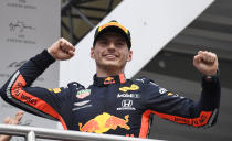 Red Bull driver Max Verstappen of the Netherland's celebrates on the podium after he won the German Formula One Grand Prix at the Hockenheimring racetrack in Hockenheim, Germany, Sunday, July 28, 2019. (AP Photo/Jens Meyer)