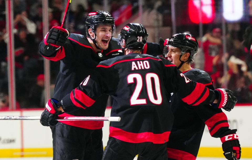 Carolina Hurricanes defenseman Brady Skjei celebrates his third-period goal against the New York Rangers.