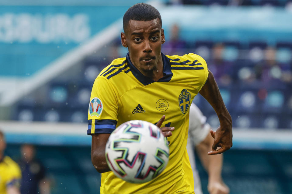 Sweden's Alexander Isak keeps his eyes on the ball during the Euro 2020 soccer championship group E match between Sweden and Slovakia, at the Saint Petersburg stadium, in Saint Petersburg, Russia, Friday, June 18, 2021. (Anatoly Maltsev, Pool via AP)