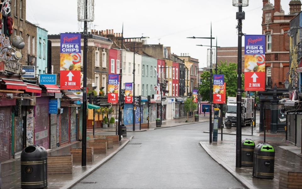 The lockdown, introduced in March, left streets in Britain's towns and cities all but deserted - Dominic Lipinski/PA