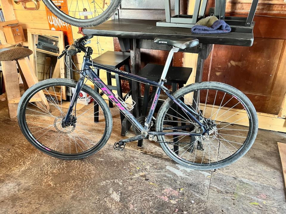 Mike O'Driscoll's bicycle is now back in his Bay Roberts shed. But searchers discovered it chained to a tree near Madrock Cafe on Saturday. His backpack was discovered not far away on a coastal hiking trail on Monday.