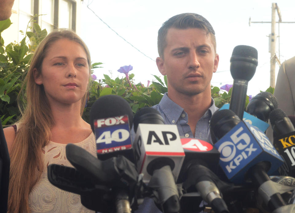 VALLEJO, CA - JULY 13: Denise Huskins and Aaron Quinn stand in silence during a press conference on July 13, 2015. (Photo by Chris Riley/MediaNews Group/Vallejo Times Herald via Getty Images)