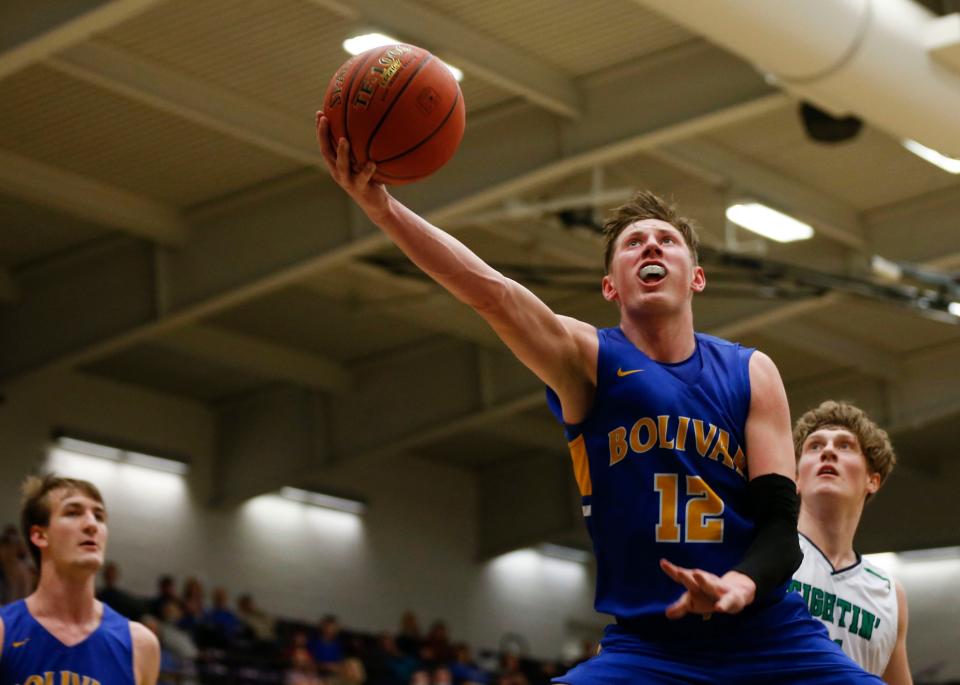 Bolivar sophomore Kyle Pock takes the ball to the basket during the class 5 district 10 championship game against Springfield Catholic at Southwest Baptist University in Bolivar on Thursday, March 4, 2021.