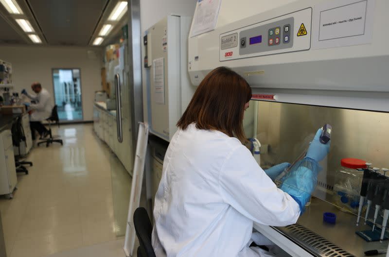 A scientist works in the lab at the Roslin Institute in Edinburgh, Scotland