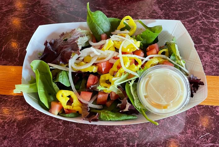 The tossed salad with a side of house-made white French dressing at The Sub Station in Wadsworth.