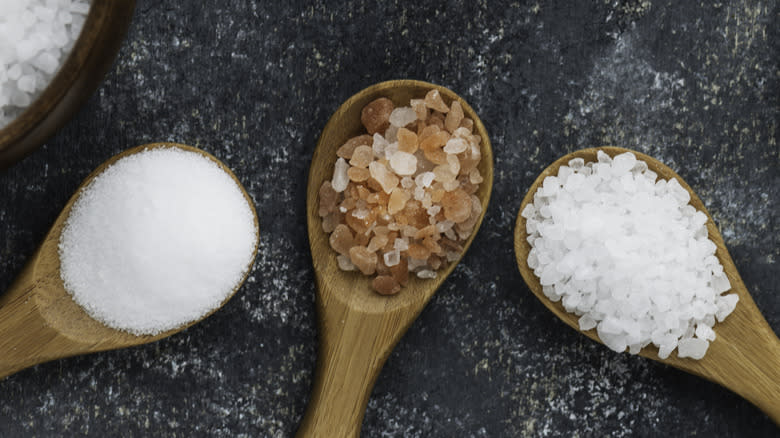 salts in various wooden spoons