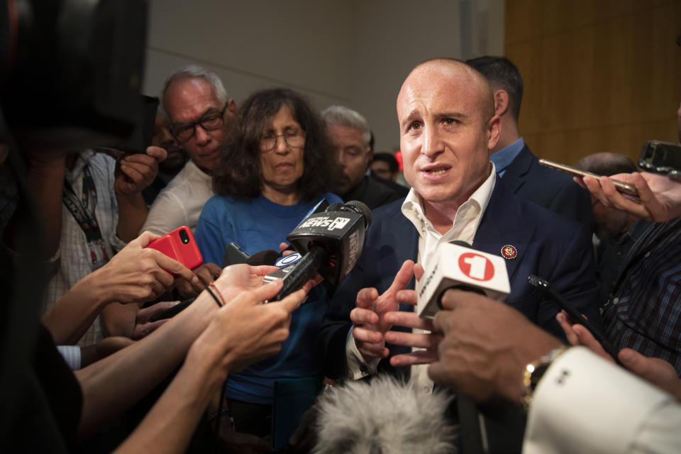 U.S. Rep. Max Rose speaks to reporters after a town hall meeting, Wednesday, Oct. 2, 2019, at the Joan and Alan Bernikow Jewish Community Center in the Staten Island borough of New York. (AP Photo/Mary Altaffer)