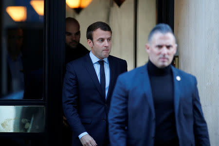 Emmanuel Macron, head of the political movement En Marche !, or Onwards !, and candidate for the 2017 presidential election, leaves his home in Paris, France, May 2, 2017. REUTERS/Benoit Tessier