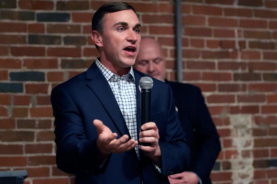 Franklin County Auditor Mike Stinziano speaks to the crowd Tuesday night at the Franklin County Democratic Party election celebration at Strongwater Food & Spirits in Columbus.