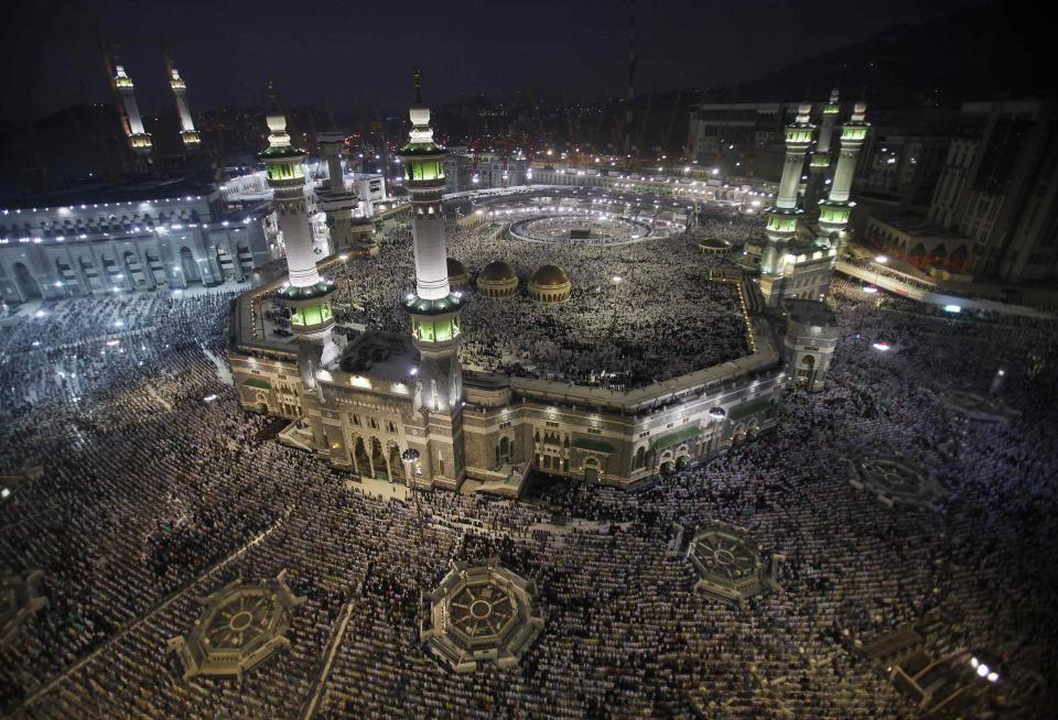 Muslim pilgrims pray at the Grand Mosque in the holy city of Mecca