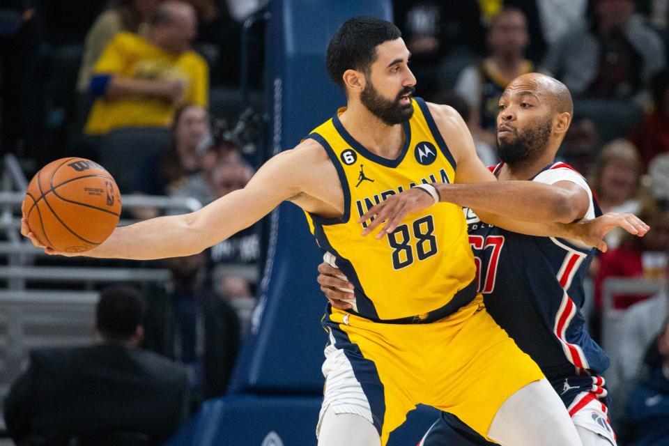 Dec 9, 2022; Indianapolis, Indiana, USA; Indiana Pacers center Goga Bitadze (88) looks to pass the ball while Washington Wizards forward Taj Gibson (67) defends in the second half at Gainbridge Fieldhouse.