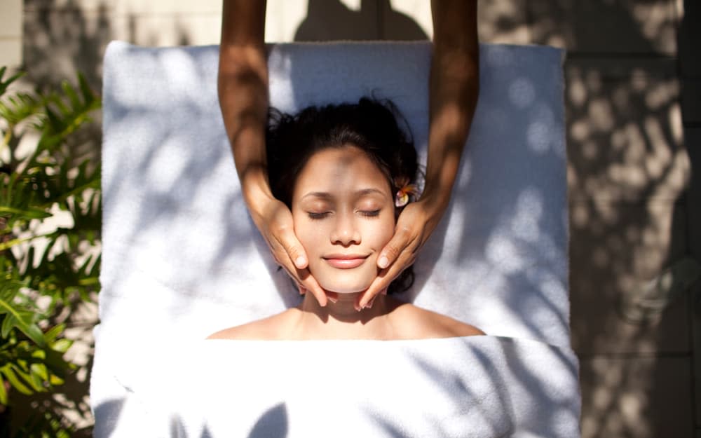 Woman having a facial - Getty