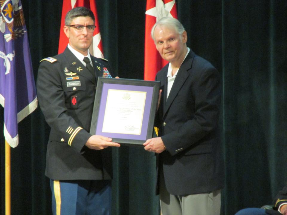 Donald Barton is inducted as an honorary member of the civil affairs regiment during a ceremony Thursday, April 20, 2023, at Fort Bragg.