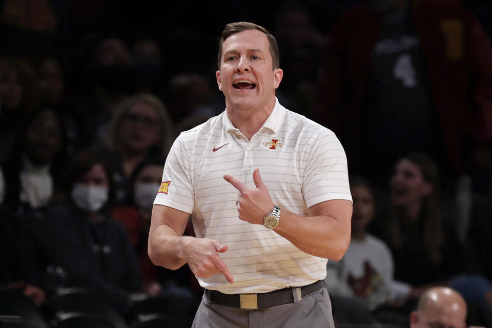 Iowa State coach T. J. Otzelberger directs the team against Memphis during the first half of an NCAA college basketball game in the NIT Season Tip-Off tournament Friday, Nov. 26, 2021, in New York. Iowa State won 78-59. (AP Photo/Adam Hunger)