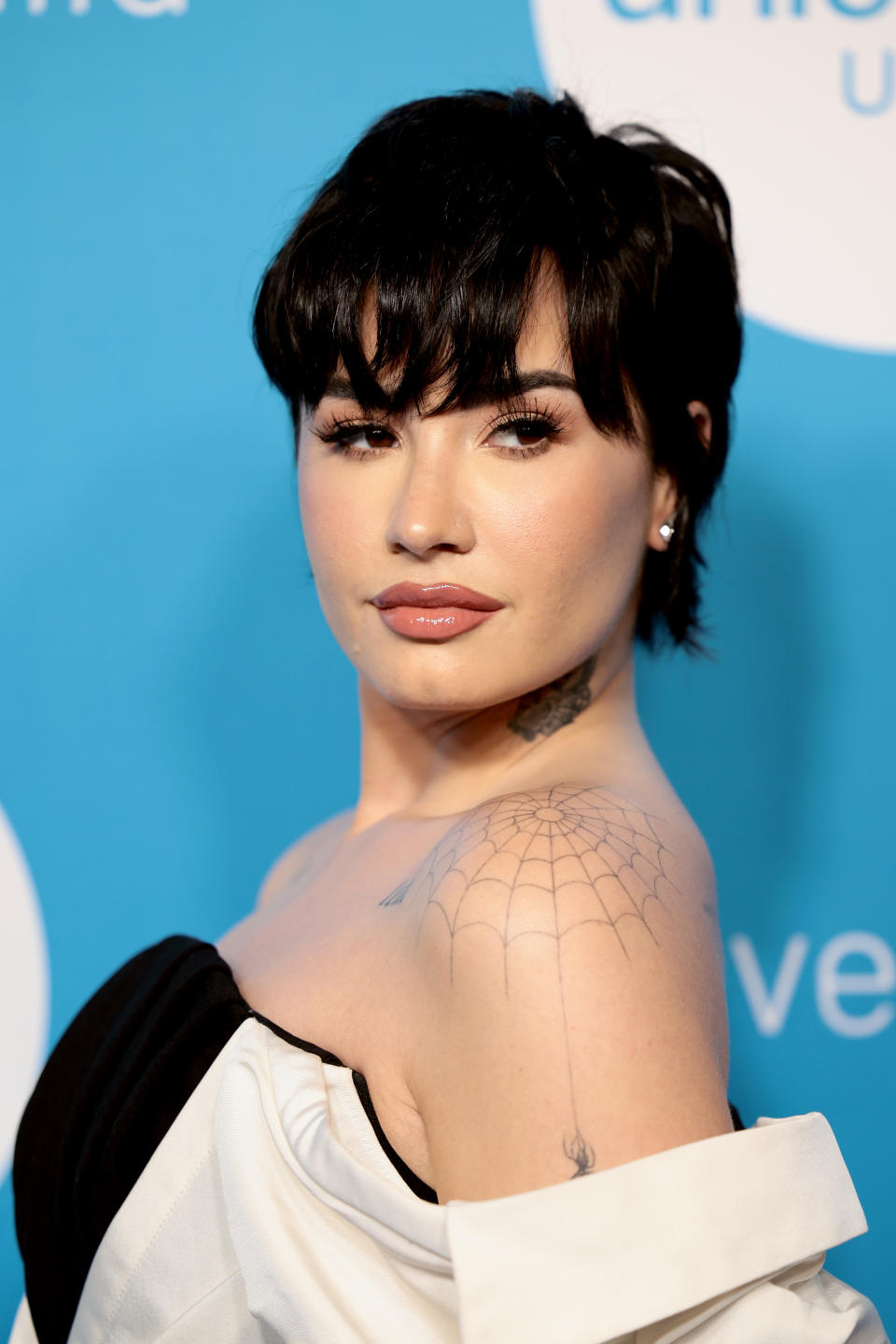 Close-up of Demi at a media event