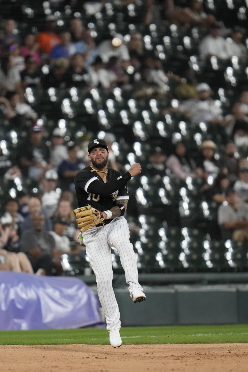 Chicago White Sox third baseman Yoan Moncada throws to first for an out during the ninth inning of a baseball game against the Detroit Tigers, Saturday, Sept. 2, 2023, in Chicago. (AP Photo/Erin Hooley)