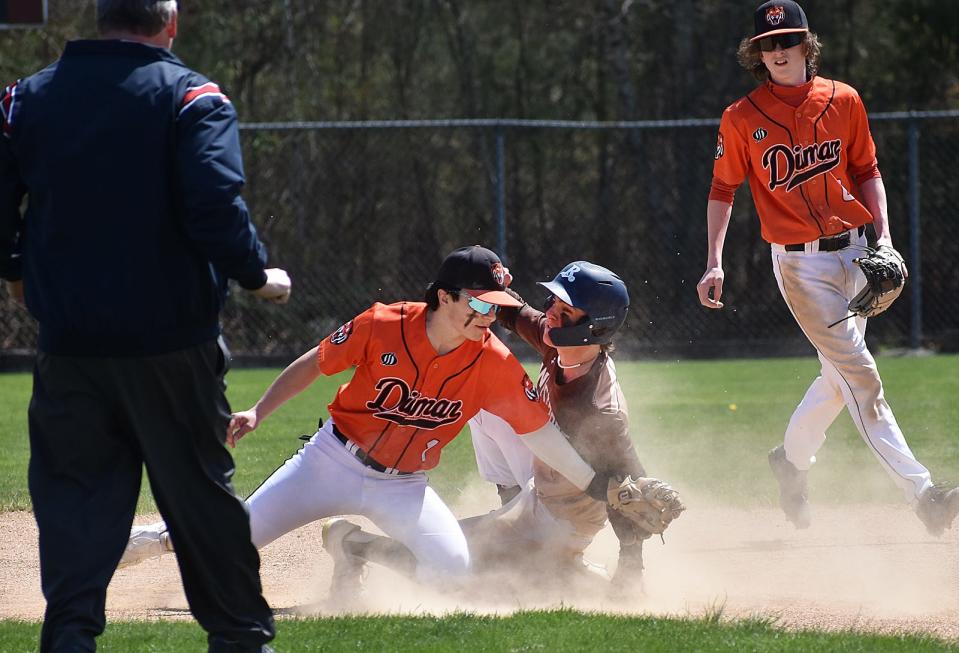 Westport's Max Gallant is safe at second as Diman's Byron Bell applies the tag.