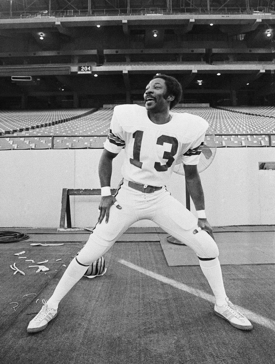 FILE - Cincinnati Bengals cornerback Ken Riley loosens up in Pontiac, Mich., Jan. 21, 1982, as the team begins their daily workout in preparation for NFL football Super Bowl 16 against the San Francisco 49ers. Riley is among those who were voted into the Pro Football Hall of Fame, it was announced Thursday, Feb. 9, 2023. (AP Photo, File)