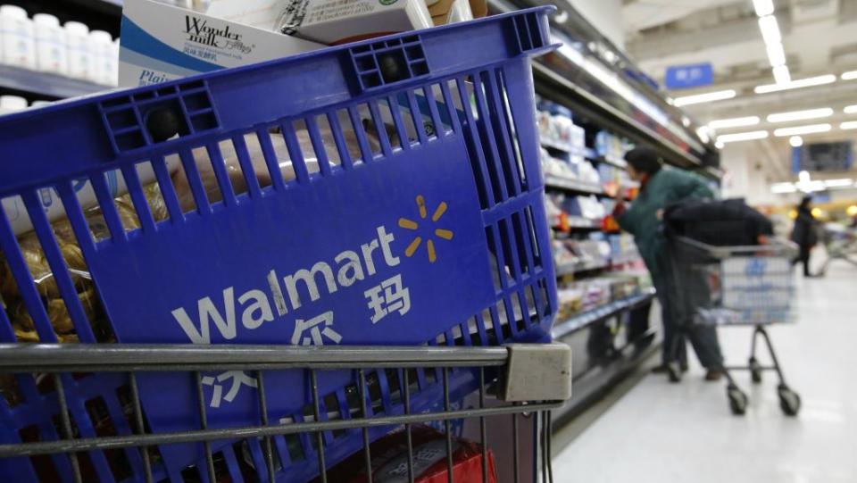 A shopping cart full of products is seen as a customer shops at a Wal-Mart store in Beijing, February 18, 2014. Wal-Mart Stores Inc, famed for its low prices, has stumbled in the one major market where consumers say price is less of a driver in their buying decisions: China. There, consumers say they want food that is safe and authentic, and, after 17 years, Wal-Mart is changing its approach, closing some big-box stores that never quite caught on with locals. Instead, it's focusing on private-label products and imports, putting its stamp on quality and safety. Picture taken February 18, 2014.