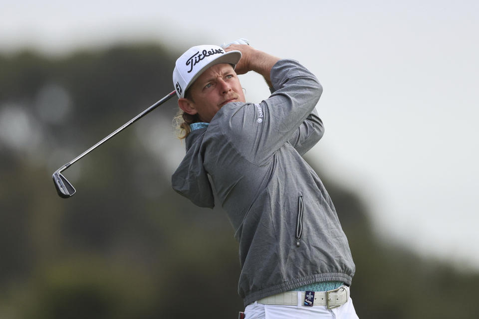 FILE - Australia's Cameron Smith plays an approach shot on the 12th hole during the Australian Open golf championship at Kingston Heath golf course in Melbourne, Australia, Friday, Dec. 2, 2022. (AP Photo/Asanka Brendon Ratnayake, File)