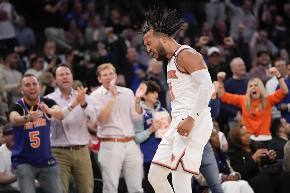 New York Knicks guard Jalen Brunson reacts after scoring a three-point basket in the first half of Game 4 in an NBA basketball first-round playoff series against the Cleveland Cavaliers, Sunday, April 23, 2023, at Madison Square Garden in New York. (AP Photo/Mary Altaffer)