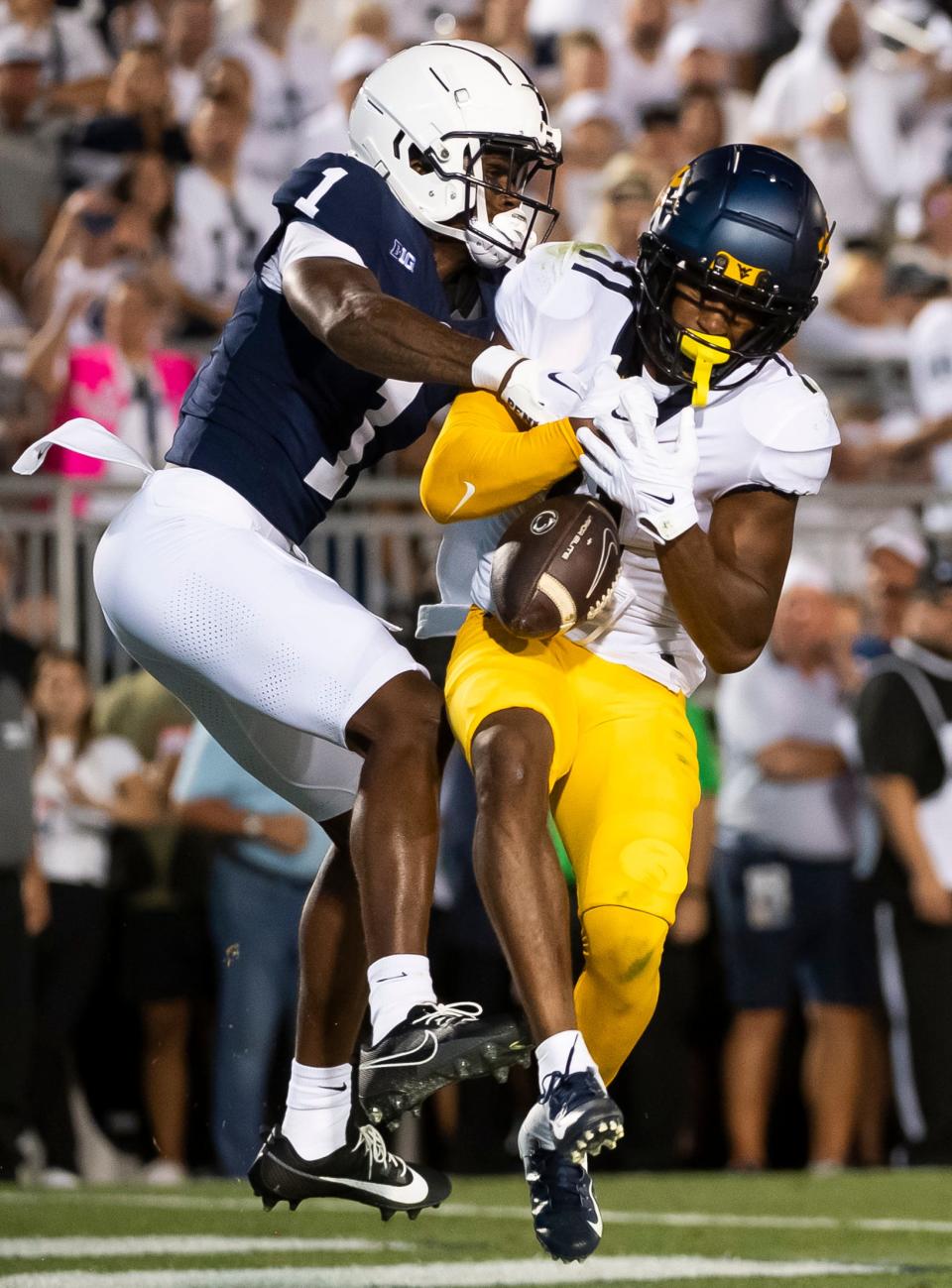 West Virginia cornerback Beanie Bishop Jr. breaks up a pass in the end zone intended for Penn State's KeAndre Lambert-Smith (1) at Beaver Stadium September 2, 2023, in State College.