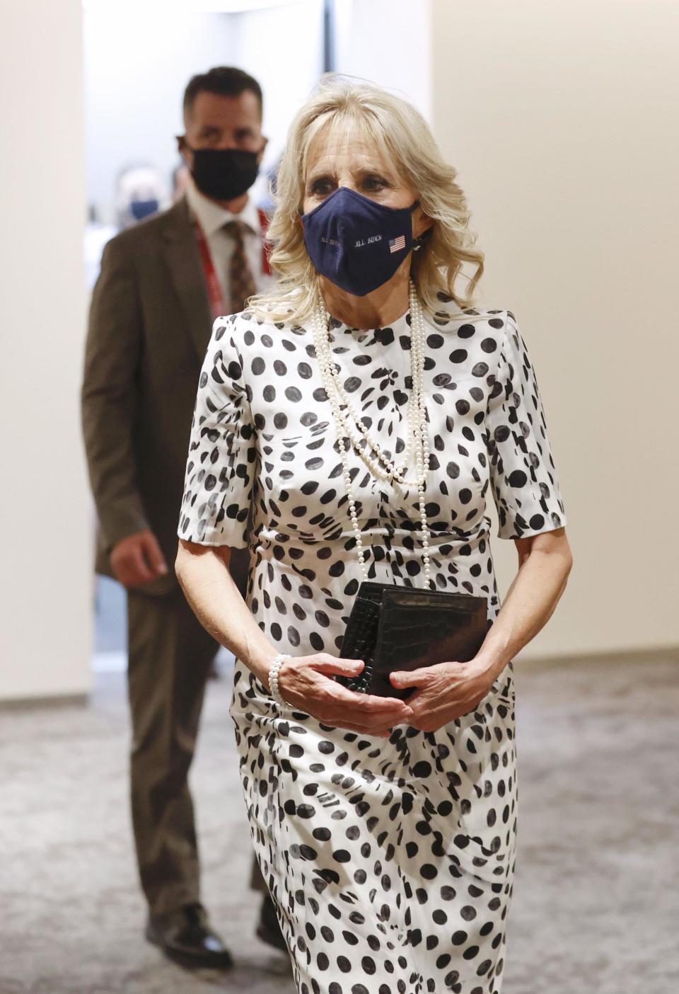 U.S. first lady Jill Biden arrives at the National Stadium in Tokyo on July 23, 2021, to attend the Tokyo Olympics opening ceremony. (Kyodo via AP Images). - Credit: Kyodo via AP Images.