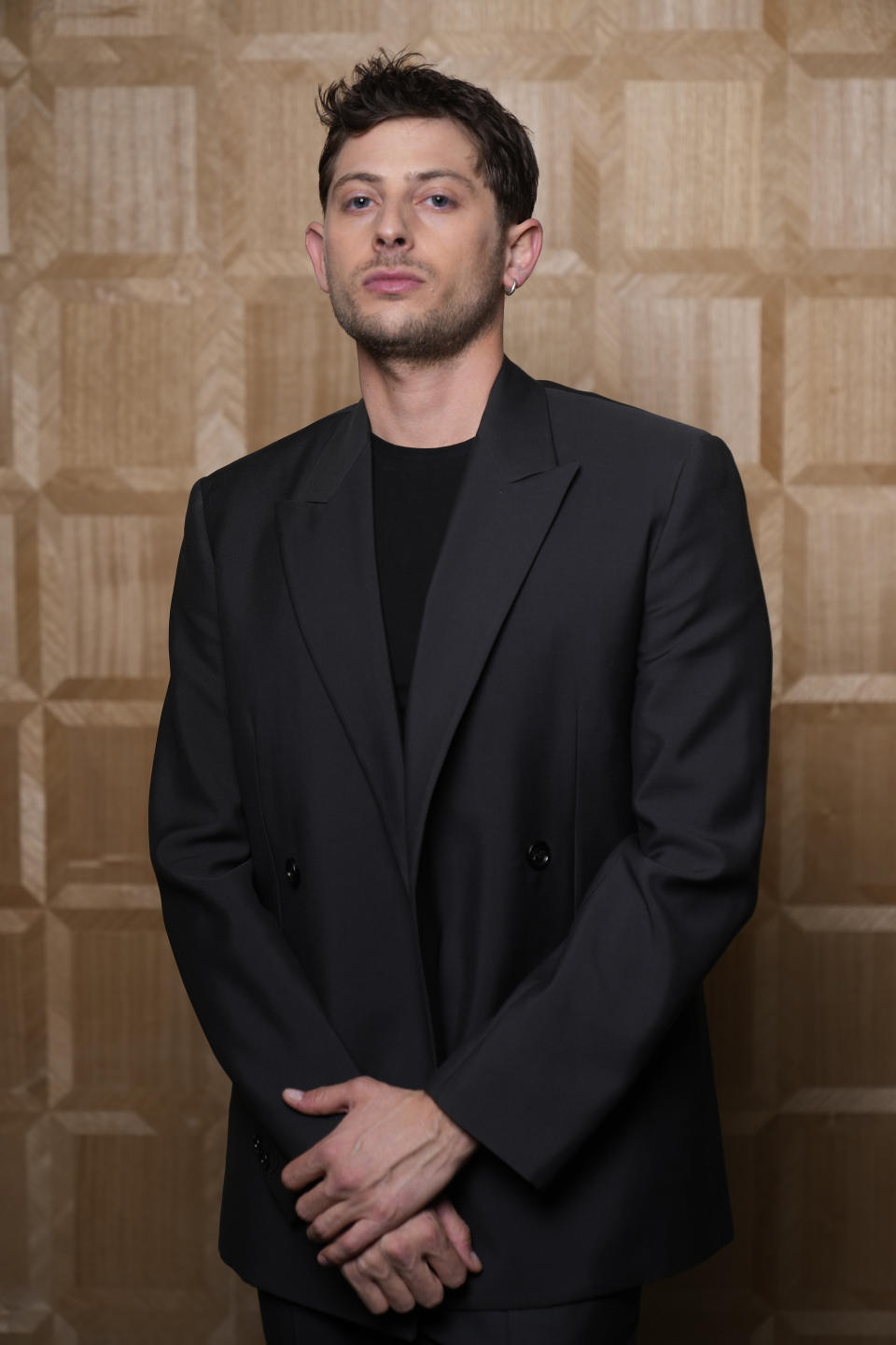 Amit Rahav poses for a portrait to promote the series "We Were the Lucky Ones" at The London West Hollywood on Wednesday, March 20, 2024, in Beverly Hills, Calif. (AP Photo/Damian Dovarganes)