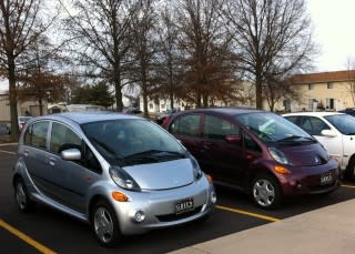 Pair of Mitsubishi i-MiEV electric cars parked at work [photo: Jen Danziger]