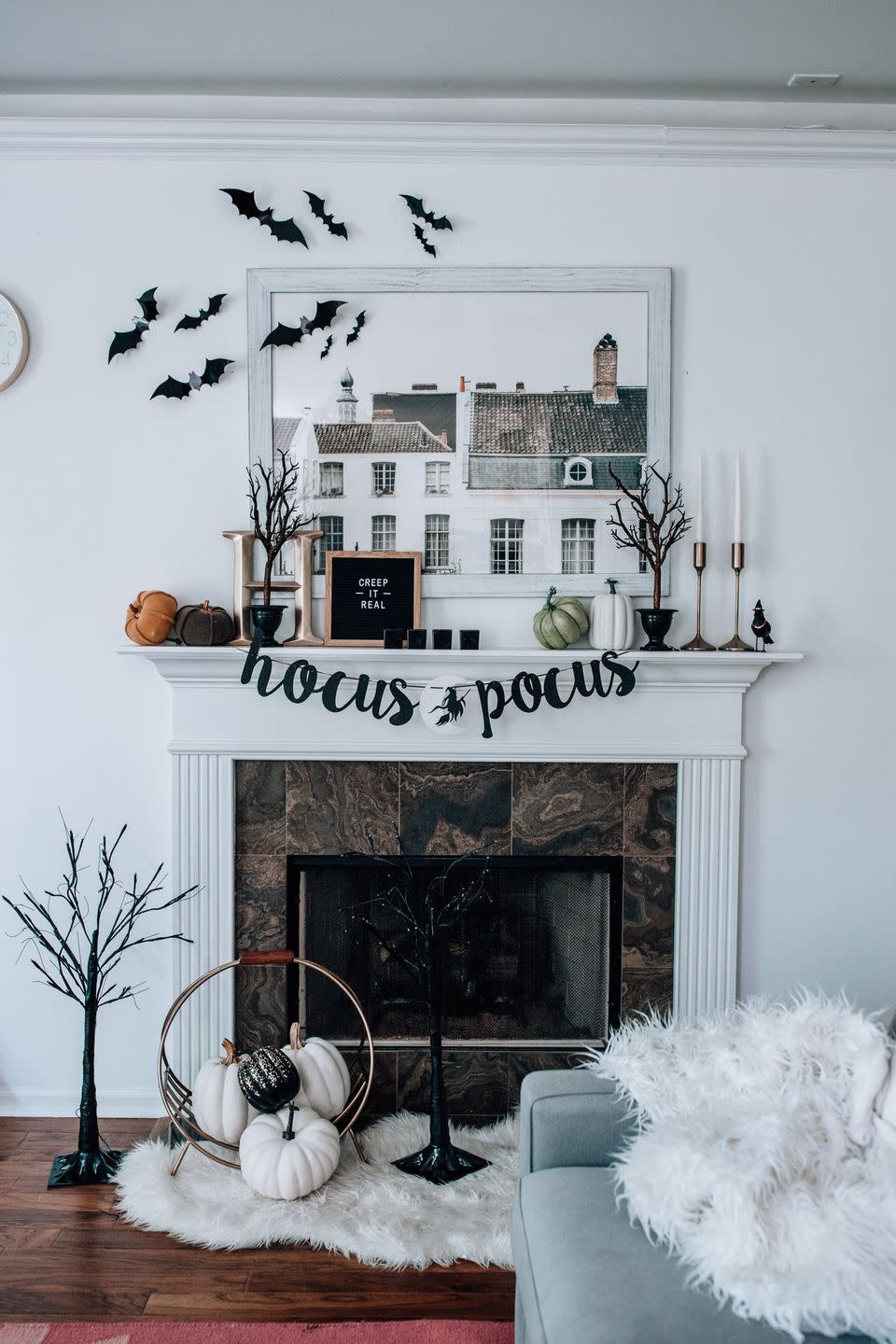 <p>You don't have to spend a fortune to make your mantel look like a million bucks. With smart-looking accents like the ones found here—that "Hocus Pocus" garland is just too fun—you can achieve a spooky and sophisticated look all at once. The "Creep it Real" felt sign adds a little humor.</p><p><strong>See more at <a href="https://www.happilyinspired.com/fall-mantel-decor/" rel="nofollow noopener" target="_blank" data-ylk="slk:Happily Inspired;elm:context_link;itc:0;sec:content-canvas" class="link ">Happily Inspired</a>.</strong></p>