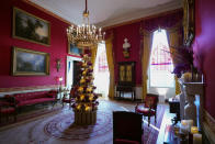 The Red Room of the White House is decorated for the holiday season during a press preview of holiday decorations at the White House, Monday, Nov. 28, 2022, in Washington. (AP Photo/Patrick Semansky)