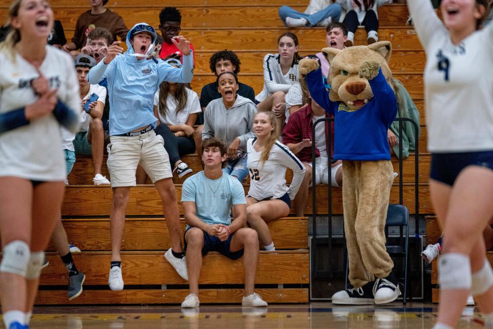 Boca Raton High School fans and players celebrate during their win against Jupiter High School in Boca Raton on September 15, 2022.