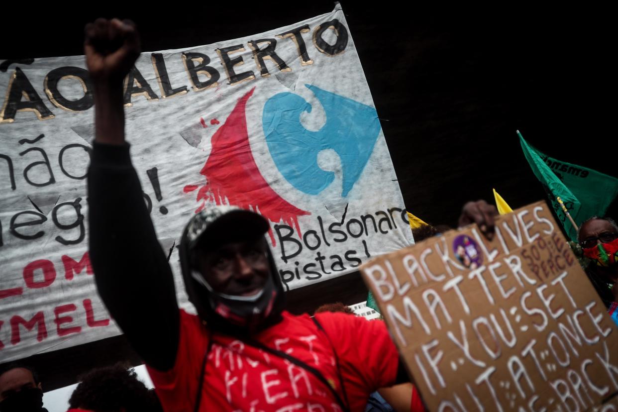  People protest against racism after the murder of Joao Silveira, in front of the Sao Paulo Museum of Art  (EPA)