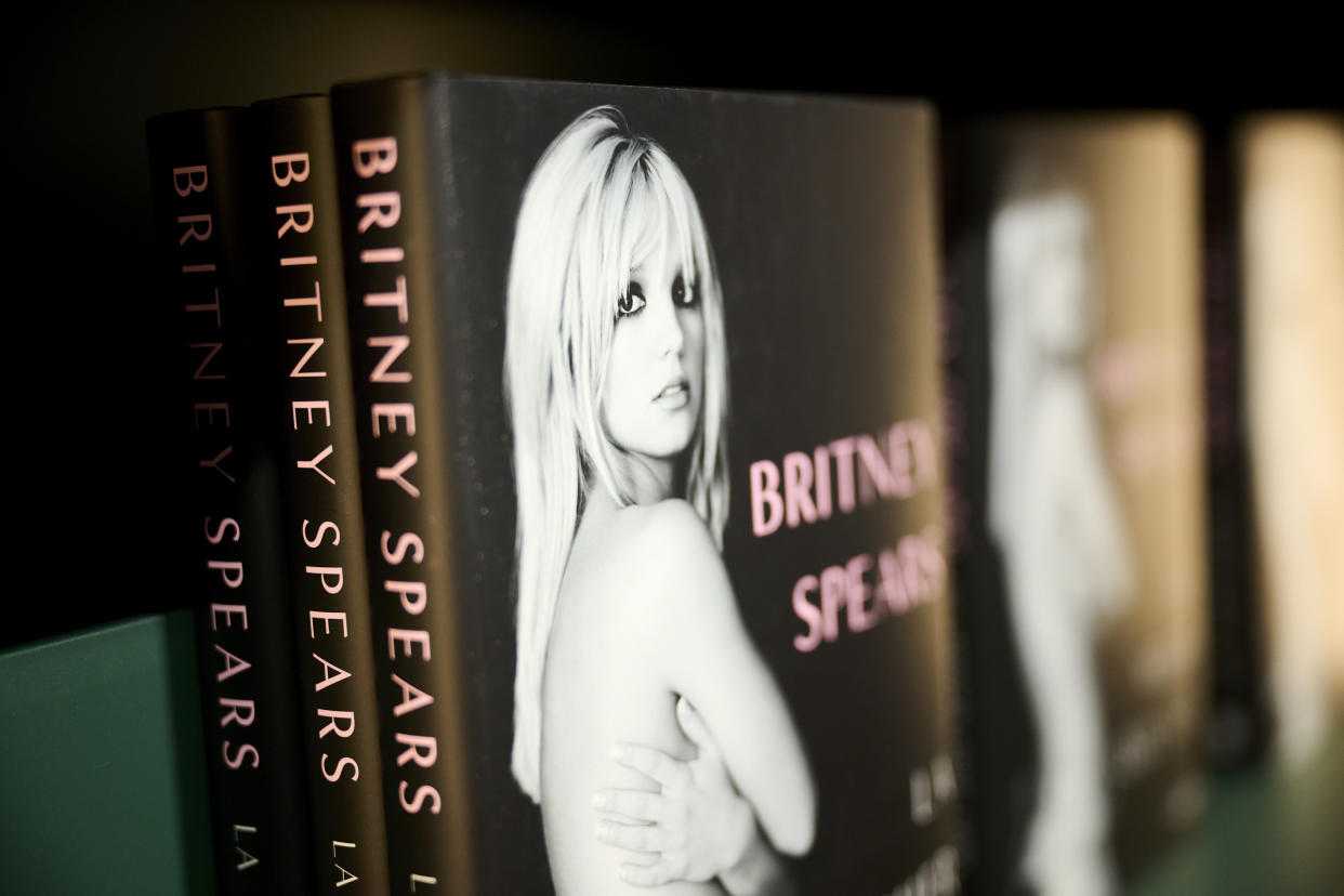 Three copies of Britney Spears’s autobiography on the shelf at a bookstore.