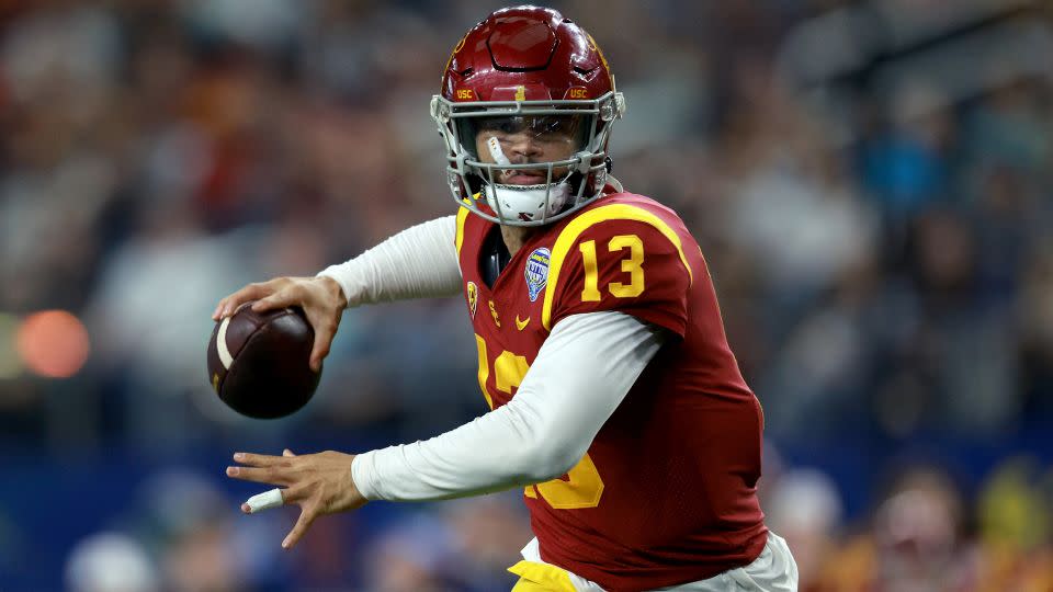 During his time with USC, Williams displayed his skill throwing the ball and running with it. - Tom Pennington/Getty Images