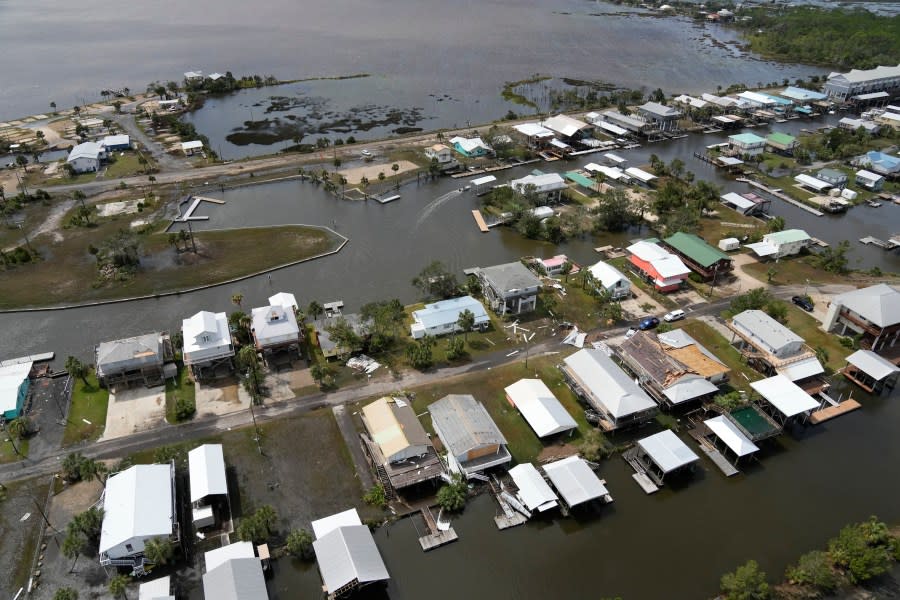 In this photo made in a flight provided by mediccorps.org, storm damage is seen in Keaton Beach, Fla., following the passage of Hurricane Idalia, Wednesday, Aug. 30, 2023. (AP Photo/Rebecca Blackwell)