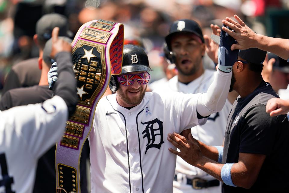 Detroit Tigers' Robbie Grossman celebrates his three-run home run against the Texas Rangers in the first inning of a baseball game in Detroit, Sunday, June 19, 2022.