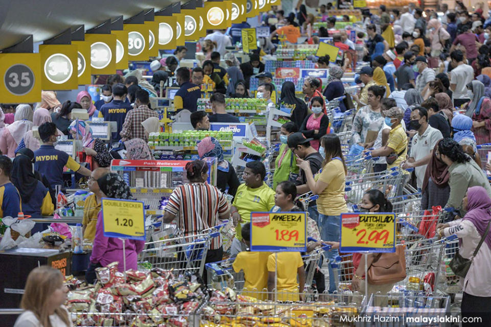 Panic buying has been an occasional feature. Here, people line up at a supermarket in Subang Jaya as they shop for essentials after the government announced the movement control order (MCO) on Mar 17, 2020.<p><br></p>