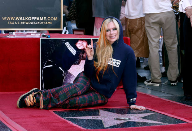 LOS ANGELES, CALIFORNIA - AUGUST 31: Avril Lavigne attends the Hollywood Walk of Fame Star Ceremony celebrating Avril Lavigne on <a href="https://parade.com/1400382/michelleparkerton/august-holidays-observances/" rel="nofollow noopener" target="_blank" data-ylk="slk:August;elm:context_link;itc:0;sec:content-canvas" class="link ">August</a> 31, 2022 in Los Angeles, California. (Photo by Emma McIntyre/Getty Images)<p><a href="https://www.gettyimages.com/detail/1419671955" rel="nofollow noopener" target="_blank" data-ylk="slk:Emma McIntyre/Getty Images;elm:context_link;itc:0;sec:content-canvas" class="link ">Emma McIntyre/Getty Images</a></p>