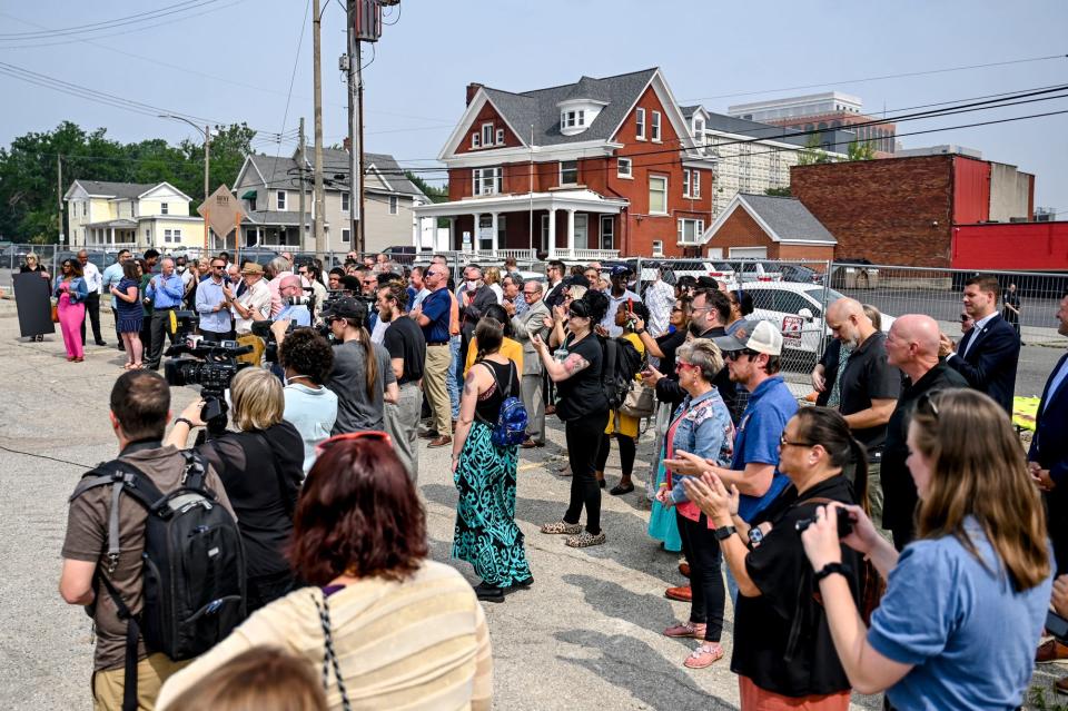 Attendees gather for a ground breaking ceremony for The Ovation music and arts venue on Wednesday, June 28, 2023, in downtown Lansing.