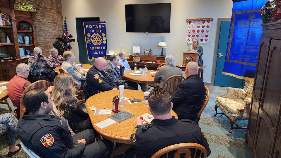 A member of the Amarillo  Rotary Club South recognizes officers of the Amarillo Police Department Thursday morning in Amarillo.