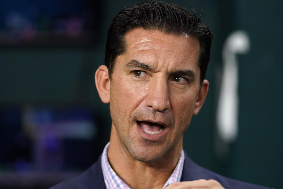 Arizona Diamondbacks general manager Mike Hazen talks with reporters before Game 2 of the baseball World Series against the Texas Rangers Saturday, Oct. 28, 2023, in Arlington, Texas. (AP Photo/Julio Cortez)