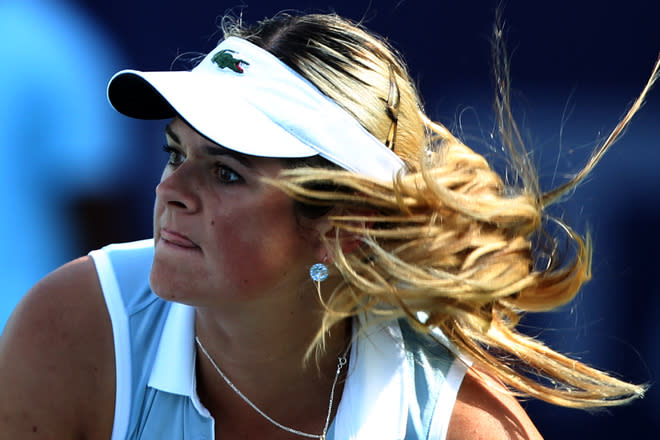 Aleksandra Wozniak of Canada watches a return to Angieszka Radwanska of Poland during their tennis match at the Duty Free Tennis Championship in Dubai, February 21, 2012. (Photo by Marwan Naamani/AFP/Getty Images)