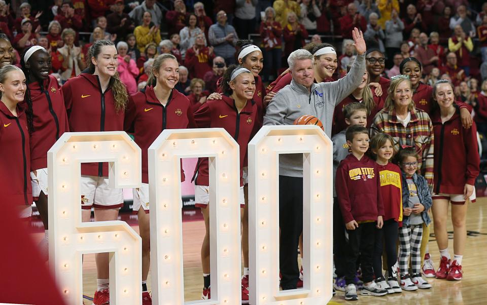 Iowa State coach Bill Fennelly waves to the Hilton Coliseum crowd during a Jan. 10 ceremony honoring him for his 600th victory with the Cyclones.