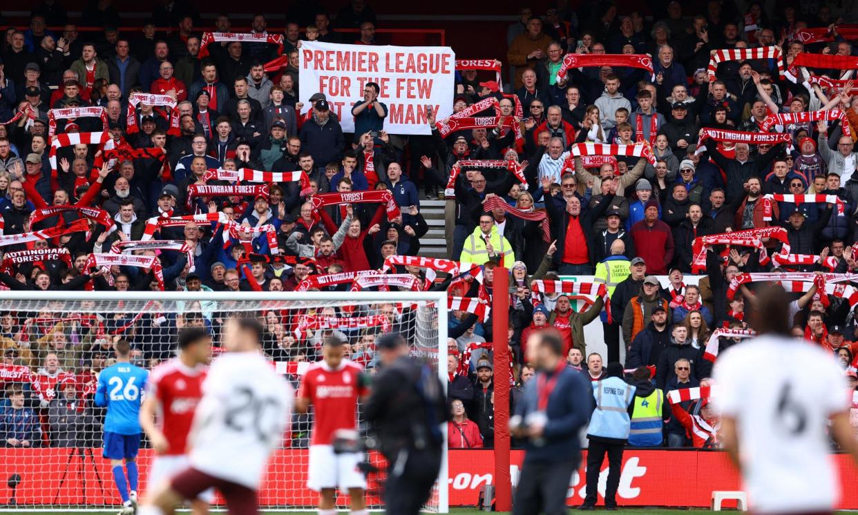 <span>Nottingham Forest fans show support for their team and dislike for the Premier League before last Sunday’s game at home to Manchester City.</span><span>Photograph: Molly Darlington/Reuters</span>
